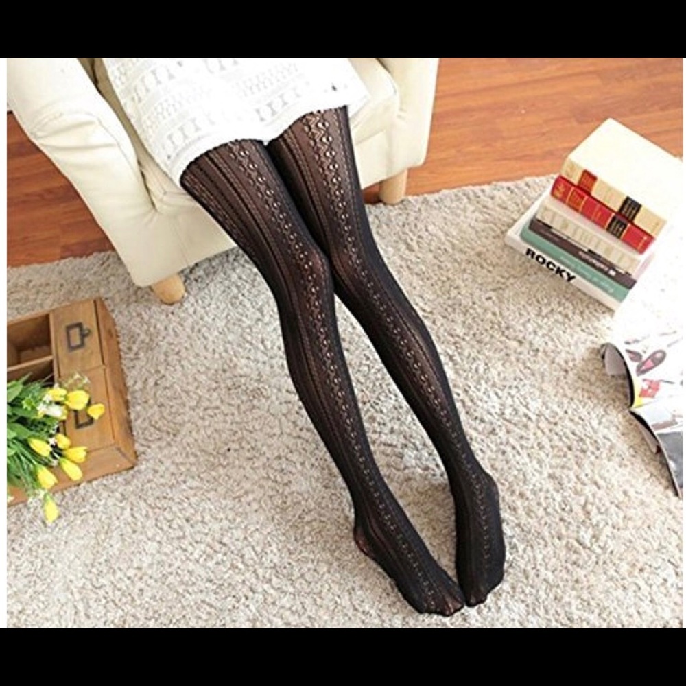 2 pairs black lace pattern tights. One size new